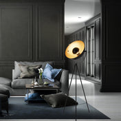 Lampe sur pied élégante noire et dorée à trois pieds pour tout espace