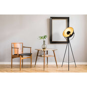 Lampe sur pied élégante noire et dorée à trois pieds pour tout espace